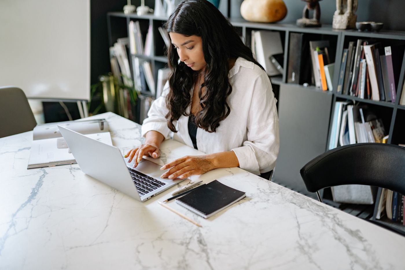 Independent professional working at a laptop